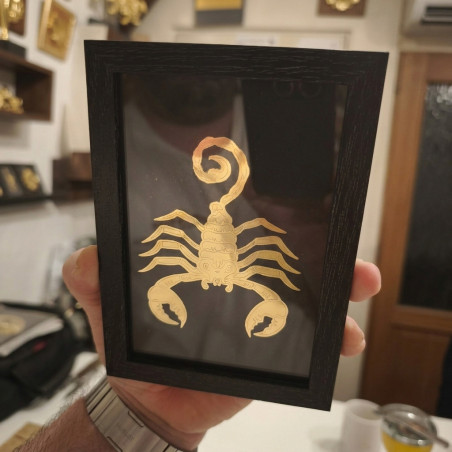 Signe astrologique doré à la feuille d'or sur verre